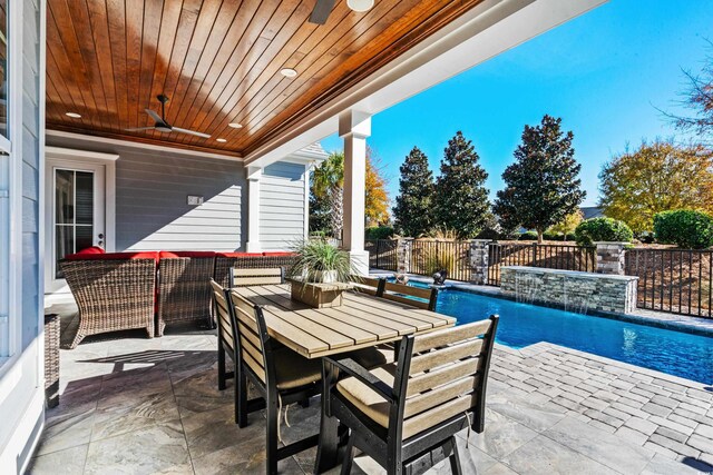 6105 Bolsena Pl, Myrtle Beach, SC 29577 - fenced backyard featuring a ceiling fan, a patio area, outdoor dining area, and outdoor lounge area