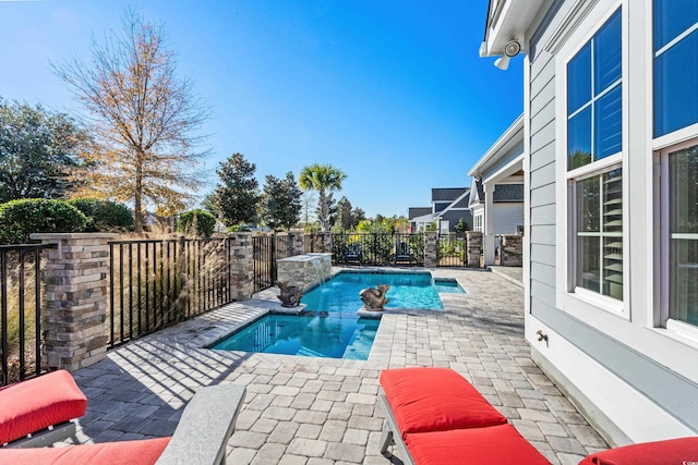 6105 Bolsena Pl, Myrtle Beach, SC 29577 - view of pool with a patio area, a fenced backyard, and a pool with connected hot tub