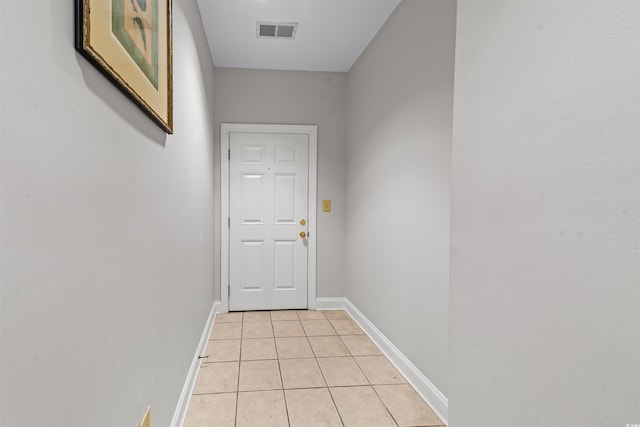 entryway featuring light tile patterned floors