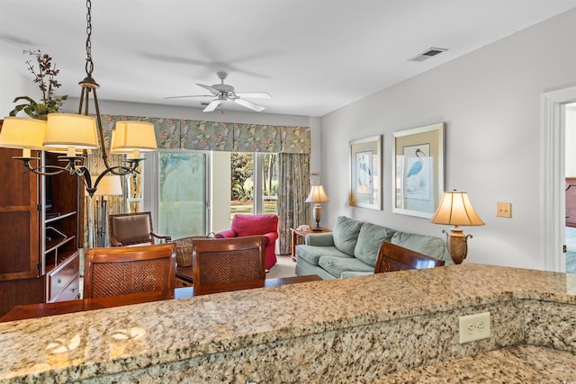 living room featuring ceiling fan