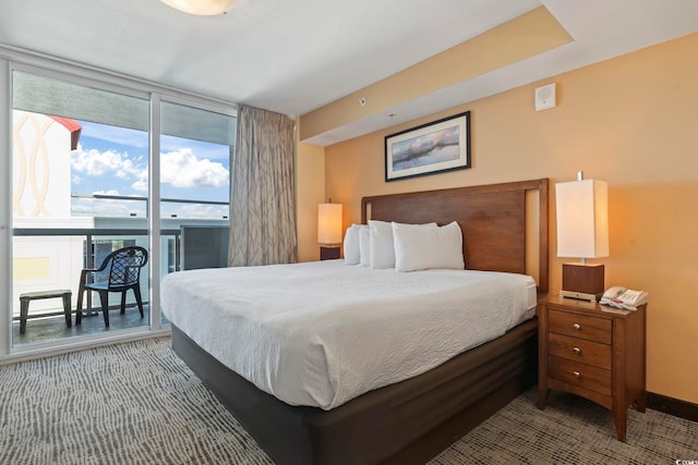 bedroom featuring carpet flooring and access to outside