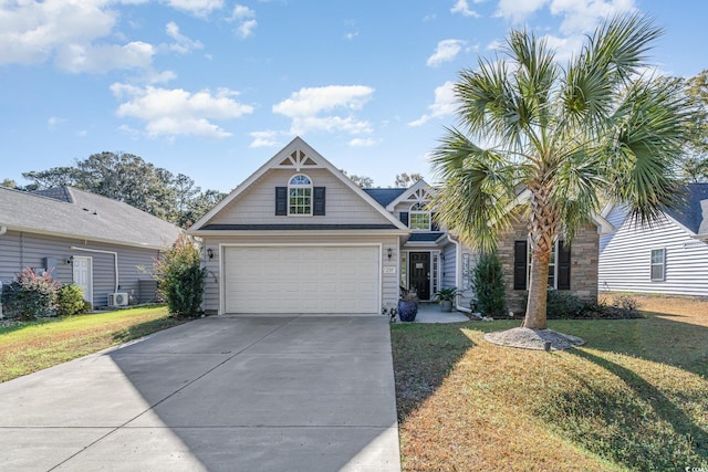 view of front of home with a garage and a front lawn