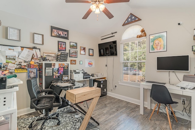 office area featuring hardwood / wood-style floors, ceiling fan, and lofted ceiling