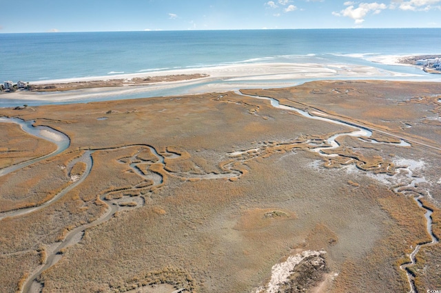 aerial view featuring a water view and a beach view