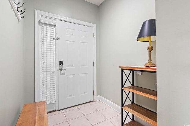 foyer with light tile patterned floors