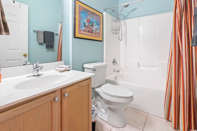 full bathroom featuring tile patterned floors, vanity, toilet, and shower / tub combo