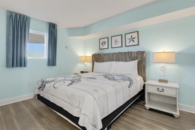 bedroom with light wood-type flooring