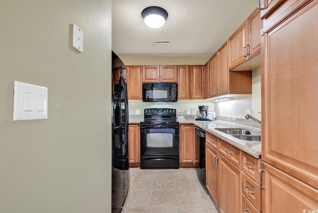 8121 Amalfi Pl Unit 5-103, Myrtle Beach, SC 29572 - kitchen featuring black appliances and a sink