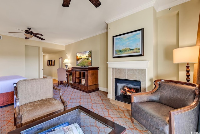 8121 Amalfi Pl Unit 5-103, Myrtle Beach, SC 29572 - living area with ceiling fan, a tiled fireplace, ornamental molding, and baseboards