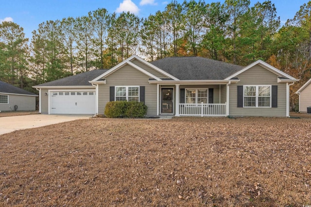 ranch-style house featuring a porch and a garage