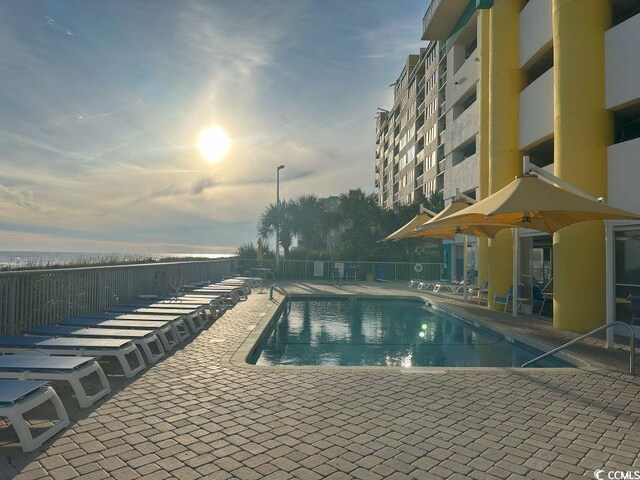 2301 S Ocean Blvd Unit 1002, North Myrtle Beach, SC 29582 - community pool with a patio area