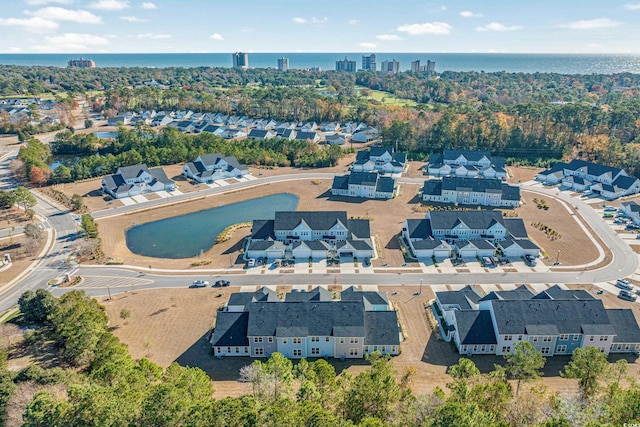 drone / aerial view with a water view