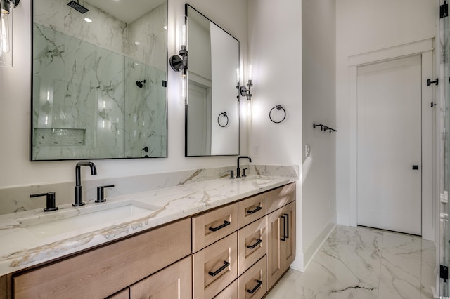 bathroom with a shower and vanity