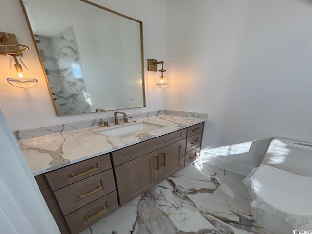 bathroom with toilet and vanity