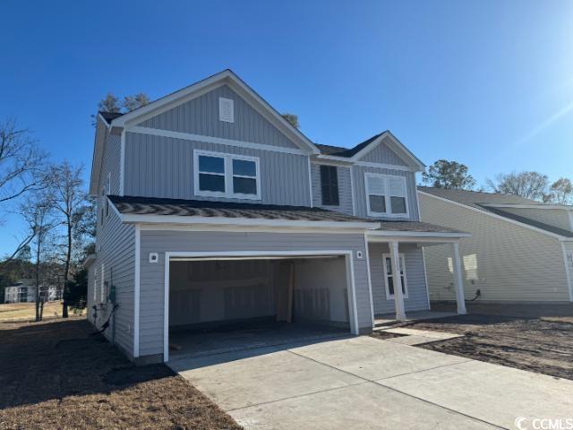 view of front of house with a garage