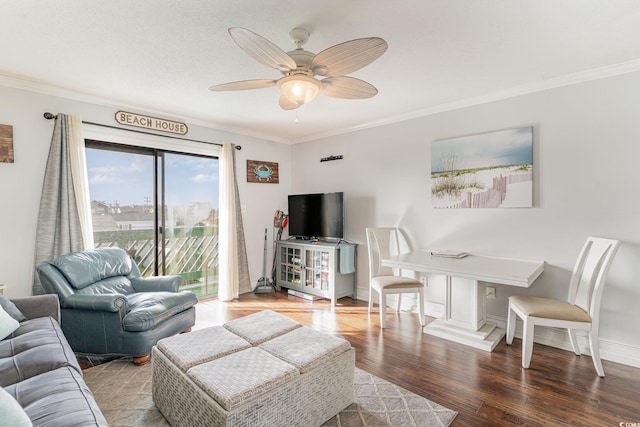 living room with crown molding, hardwood / wood-style floors, and ceiling fan