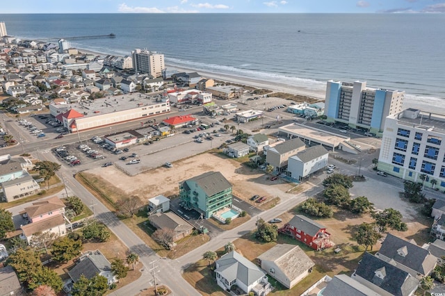 aerial view with a view of the beach and a water view