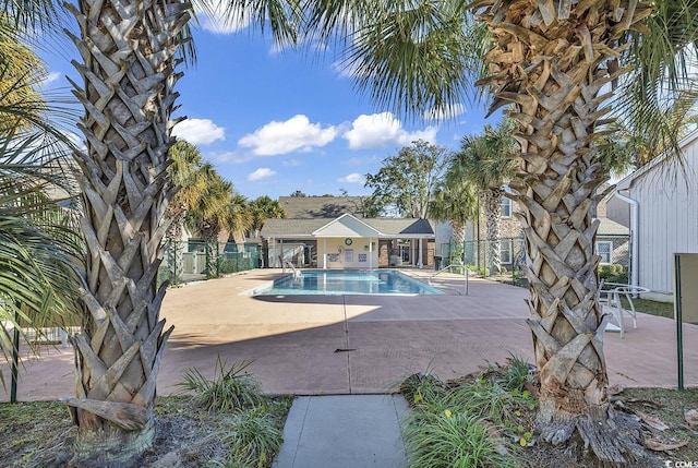 view of swimming pool featuring a patio area