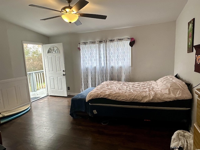 bedroom featuring access to exterior, ceiling fan, dark wood-type flooring, and lofted ceiling