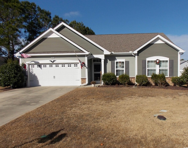 ranch-style house featuring a garage