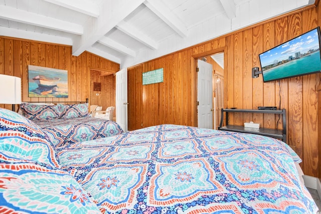 bedroom with vaulted ceiling with beams and wood walls