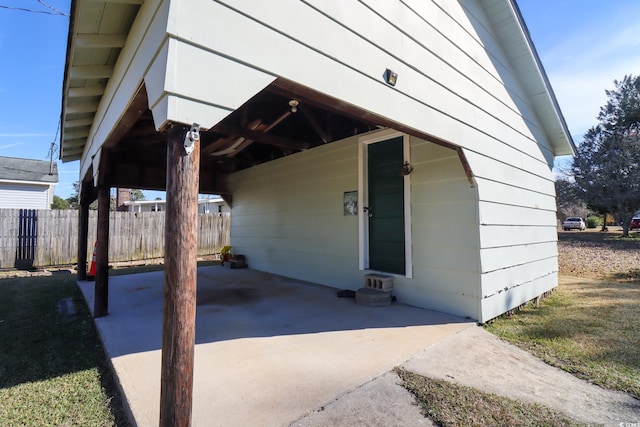 exterior space with a carport