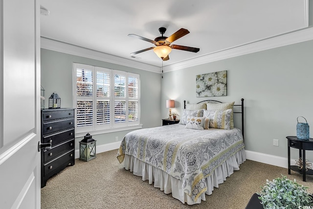 carpeted bedroom featuring ceiling fan and crown molding