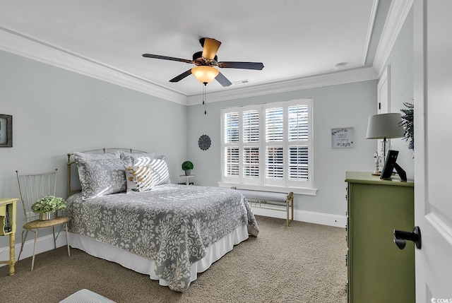 carpeted bedroom featuring ceiling fan and crown molding