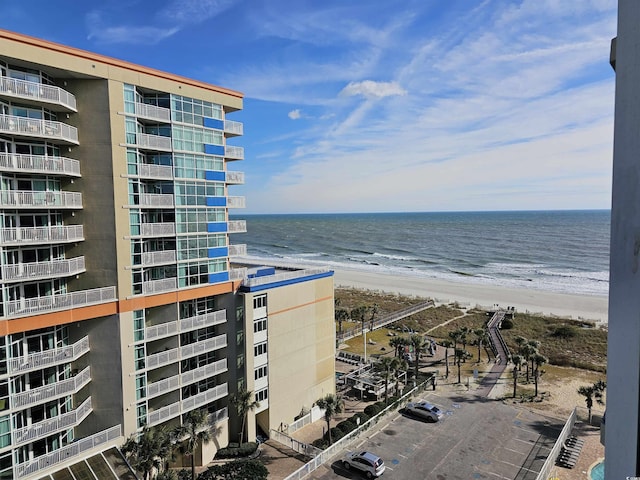 property view of water featuring a beach view