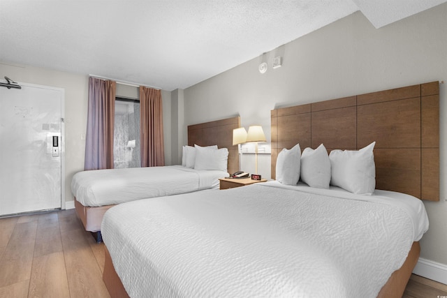 bedroom featuring light hardwood / wood-style flooring