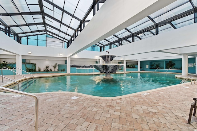 view of pool featuring pool water feature