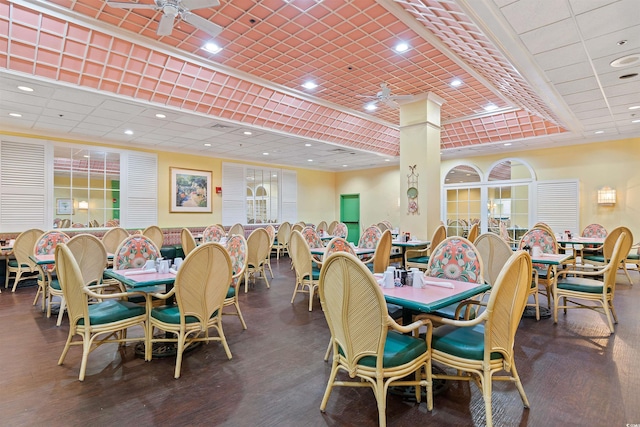 dining room with ceiling fan and hardwood / wood-style flooring