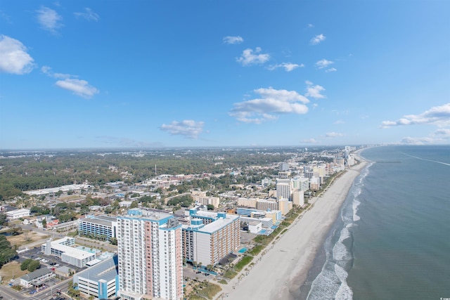 aerial view with a water view and a beach view