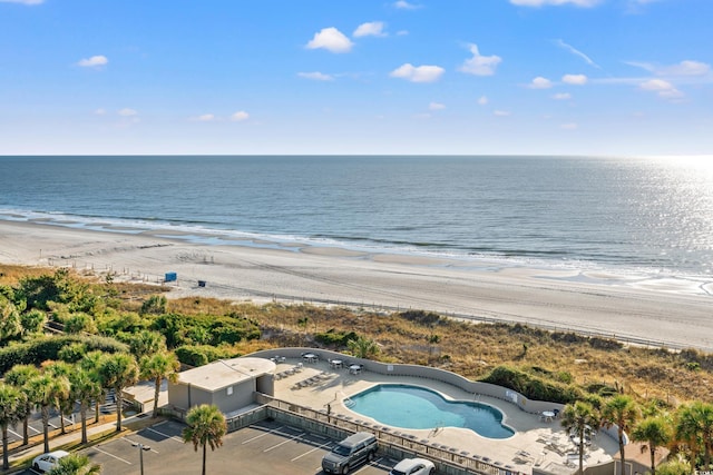 aerial view with a view of the beach and a water view