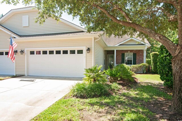 view of front of home with a garage