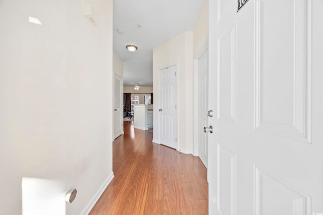 hall featuring hardwood / wood-style flooring