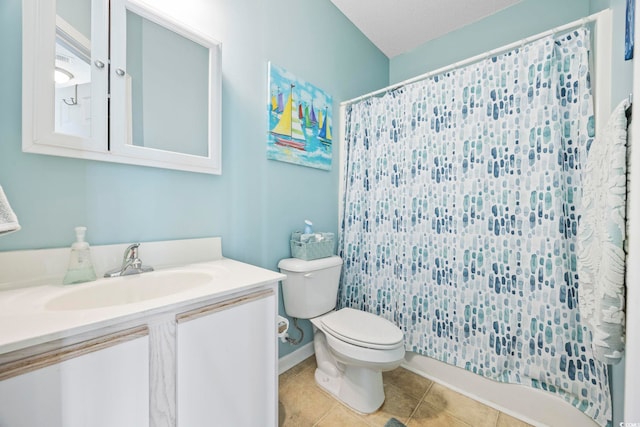 bathroom with vanity, tile patterned flooring, a shower with shower curtain, toilet, and a textured ceiling