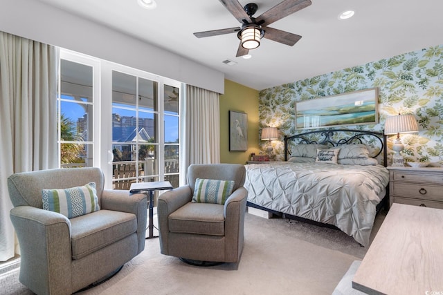 carpeted bedroom featuring ceiling fan