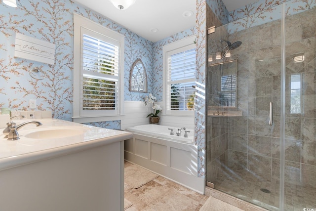 bathroom with vanity and separate shower and tub