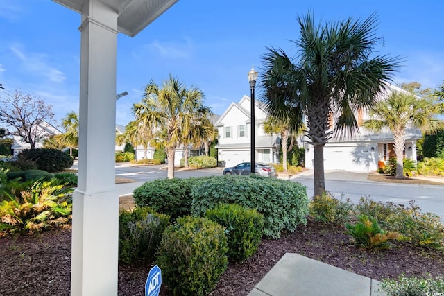 view of yard featuring a garage