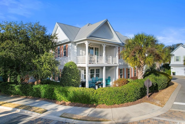 view of front of home with a balcony