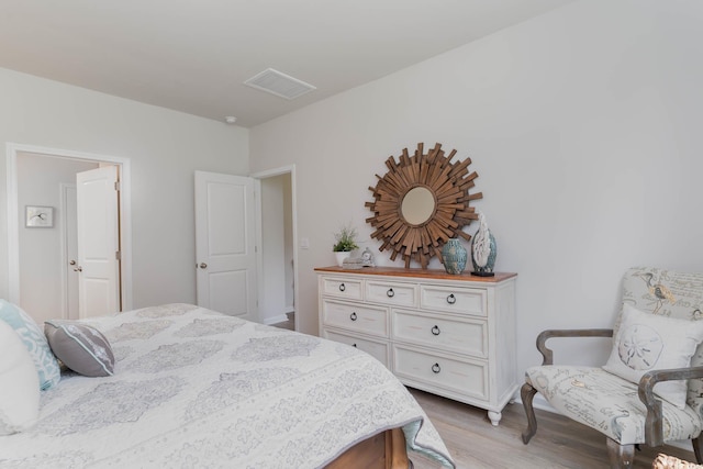 bedroom with light hardwood / wood-style flooring