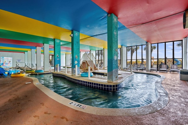 view of pool featuring an indoor hot tub