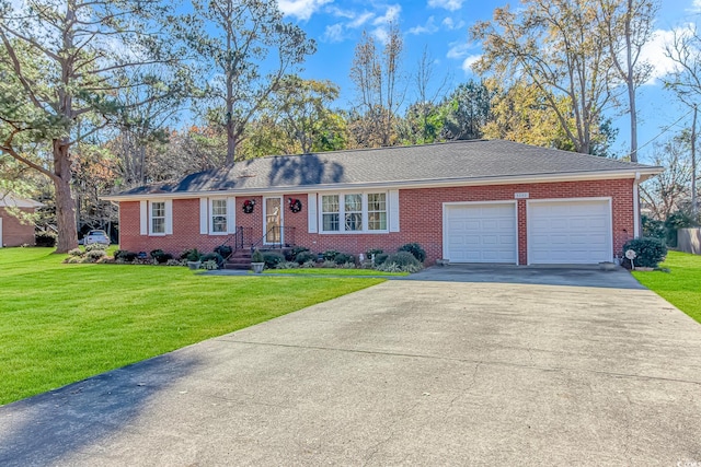 ranch-style house with a garage and a front lawn