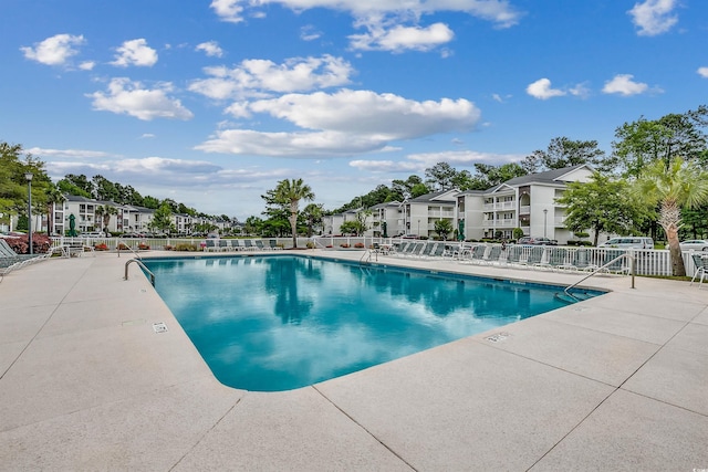 1286 River Oaks Dr Unit 8-M, Myrtle Beach, SC 29579 - community pool featuring a patio area