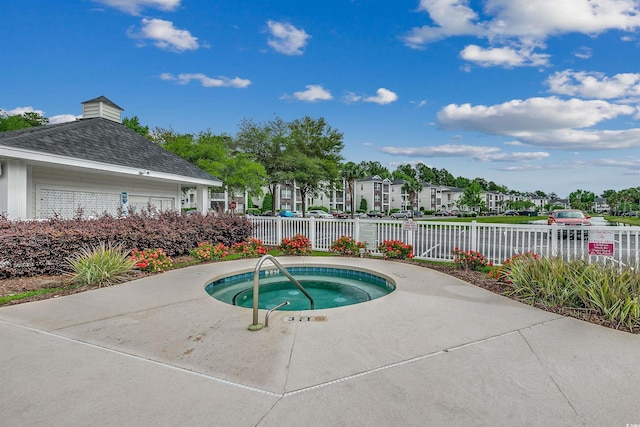 1286 River Oaks Dr Unit 8-M, Myrtle Beach, SC 29579 - view of pool with a community hot tub and a residential view