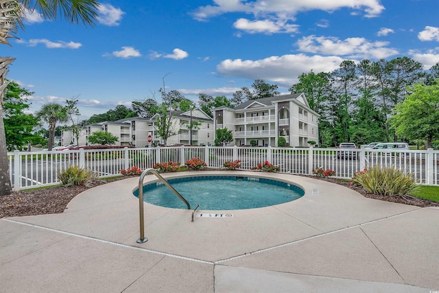 1286 River Oaks Dr Unit 8-M, Myrtle Beach, SC 29579 - view of pool with a pool and a patio