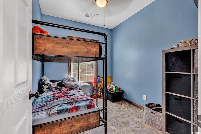 bedroom featuring ceiling fan