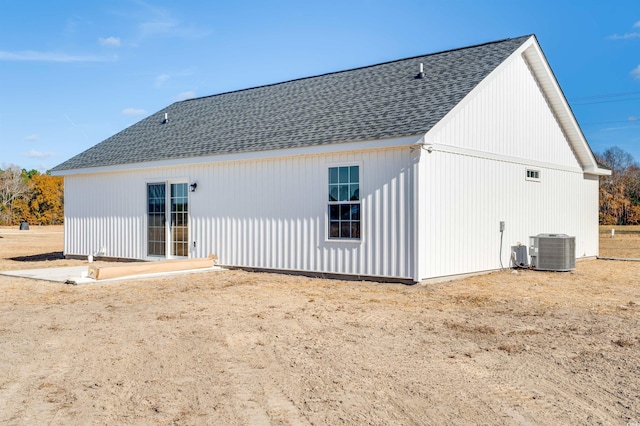 back of property with central air condition unit