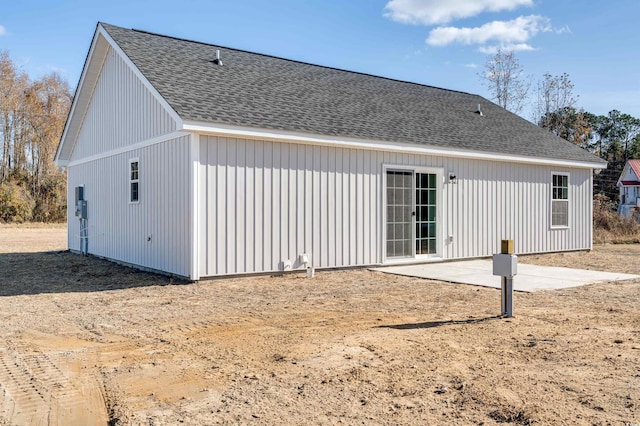 back of property with a patio area